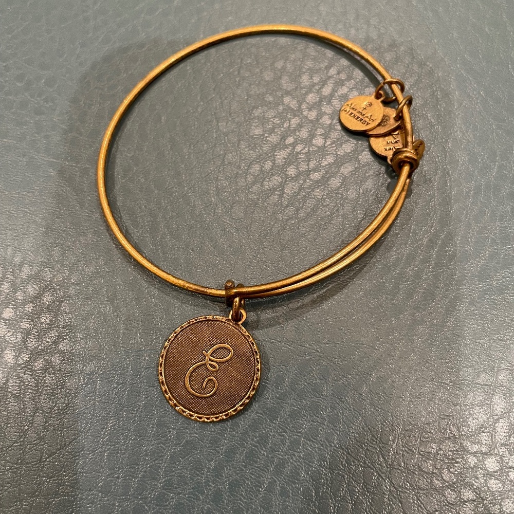 Alex and Ani gold tone bangle bracelet initial “E”